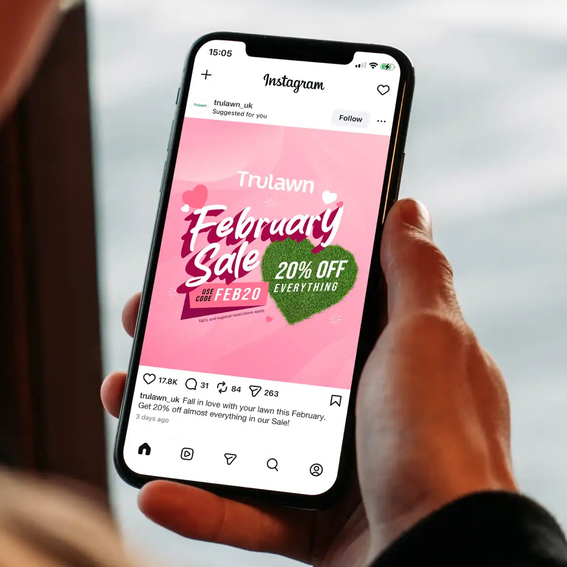 A mobile phone displaying an Instagram advert